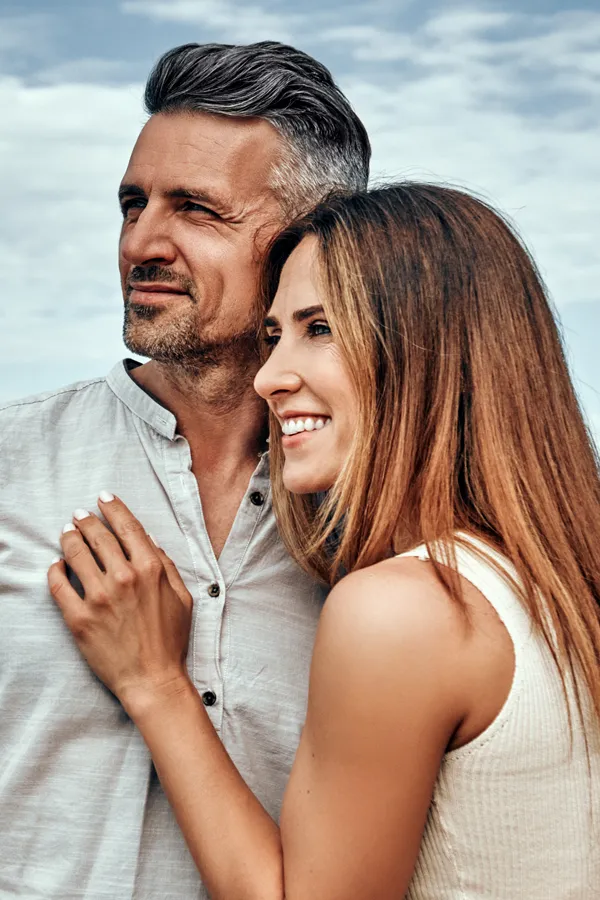 Medical-Genetic-Testing-Treatment A healthy middle-aged couple look out onto the ocean. Get Medical Genetic Testing from Tanya Zboril, NP of TBT Medical in Halifax.